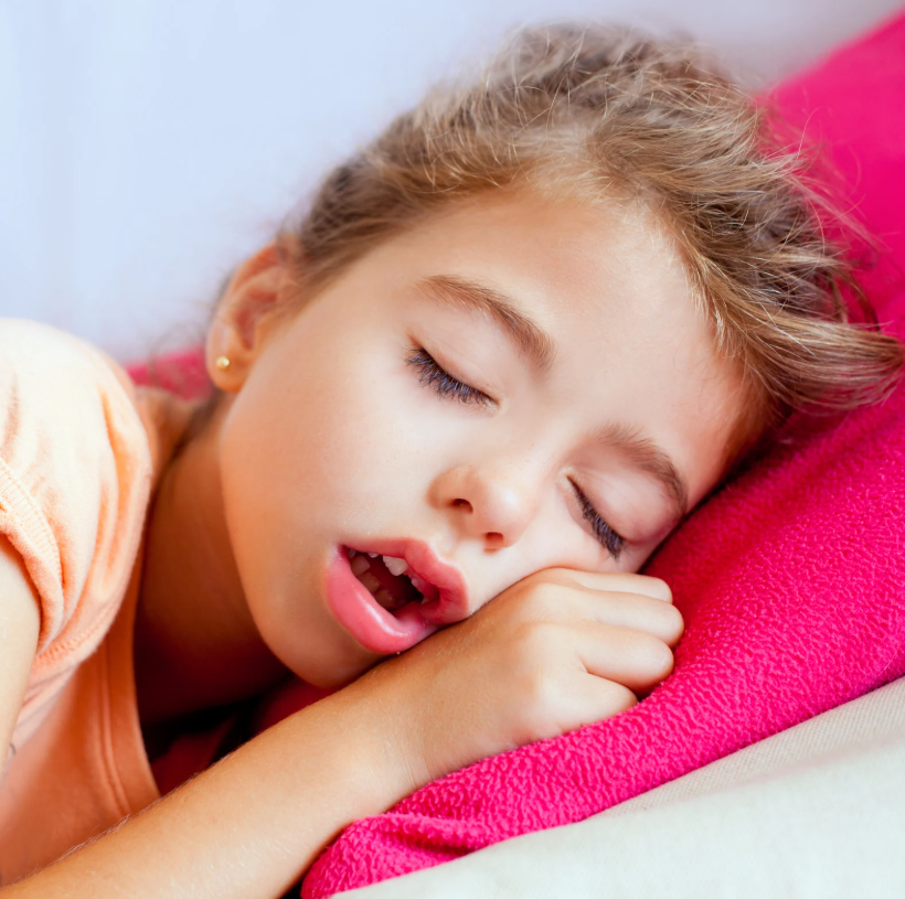 child sleeping with mouth open during airway screening at pediatric dental office in Bedminster