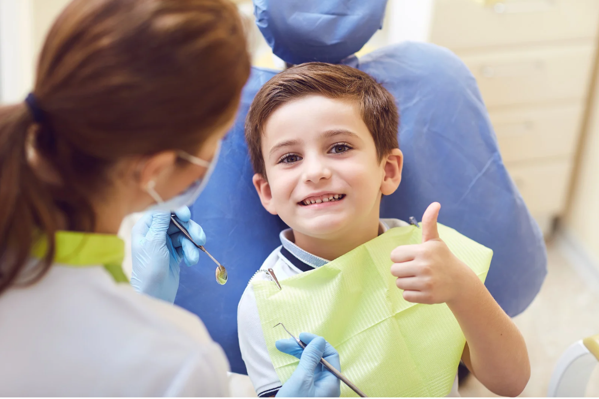 happy child after cavity treatment using SDF or ICON at pediatric dentist in Bedminster